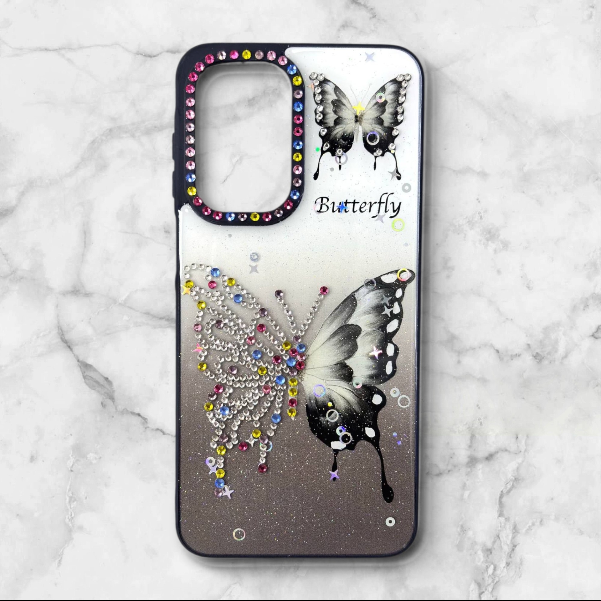  قاب طرح دار سامسونگsamsunga56 قاب پروانه نگین‌دار BUTTERFLY رنگ مشکی – یونیک کیس 