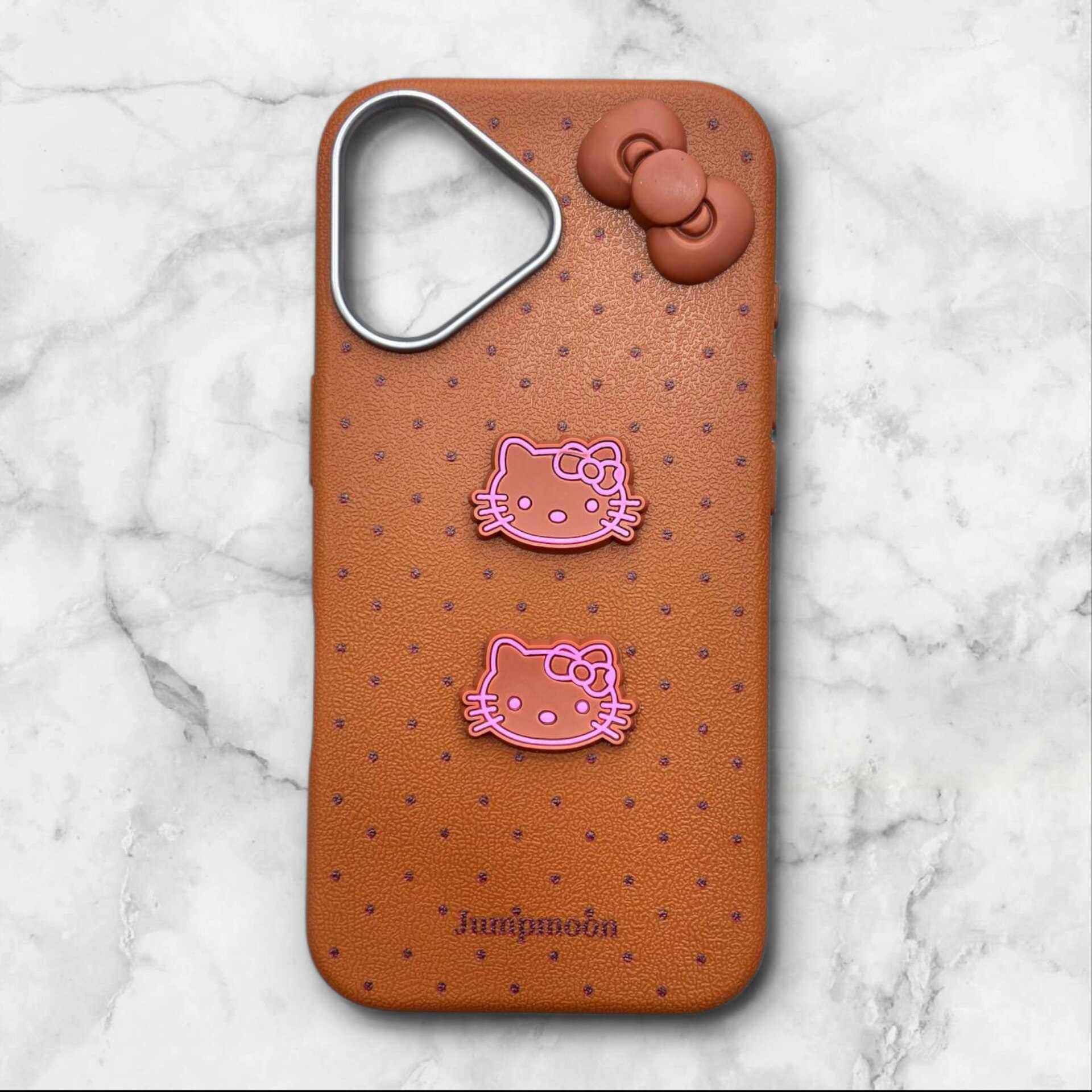 کاور طرح دار ایفونiphone16 هلوکیتی jumpmoon رنگ قهوه ای – یونیک کیس
