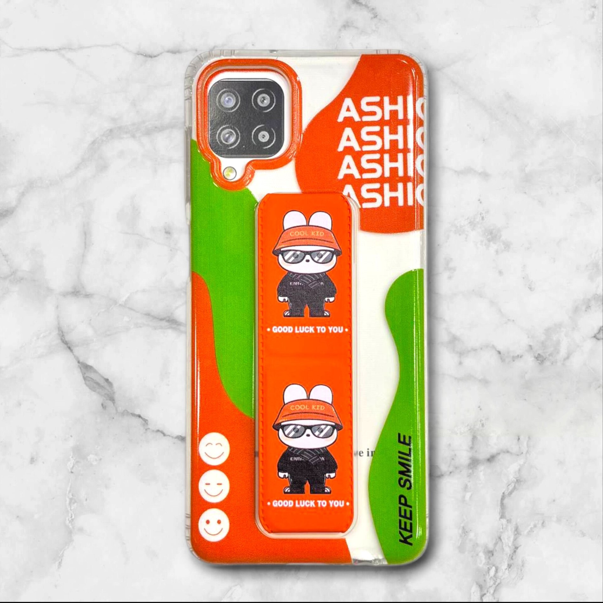  قاب طرح دار سامسونگsamsunga12 استندی شفاف GOODLUCK رنگ نارنجی – یونیک کیس 