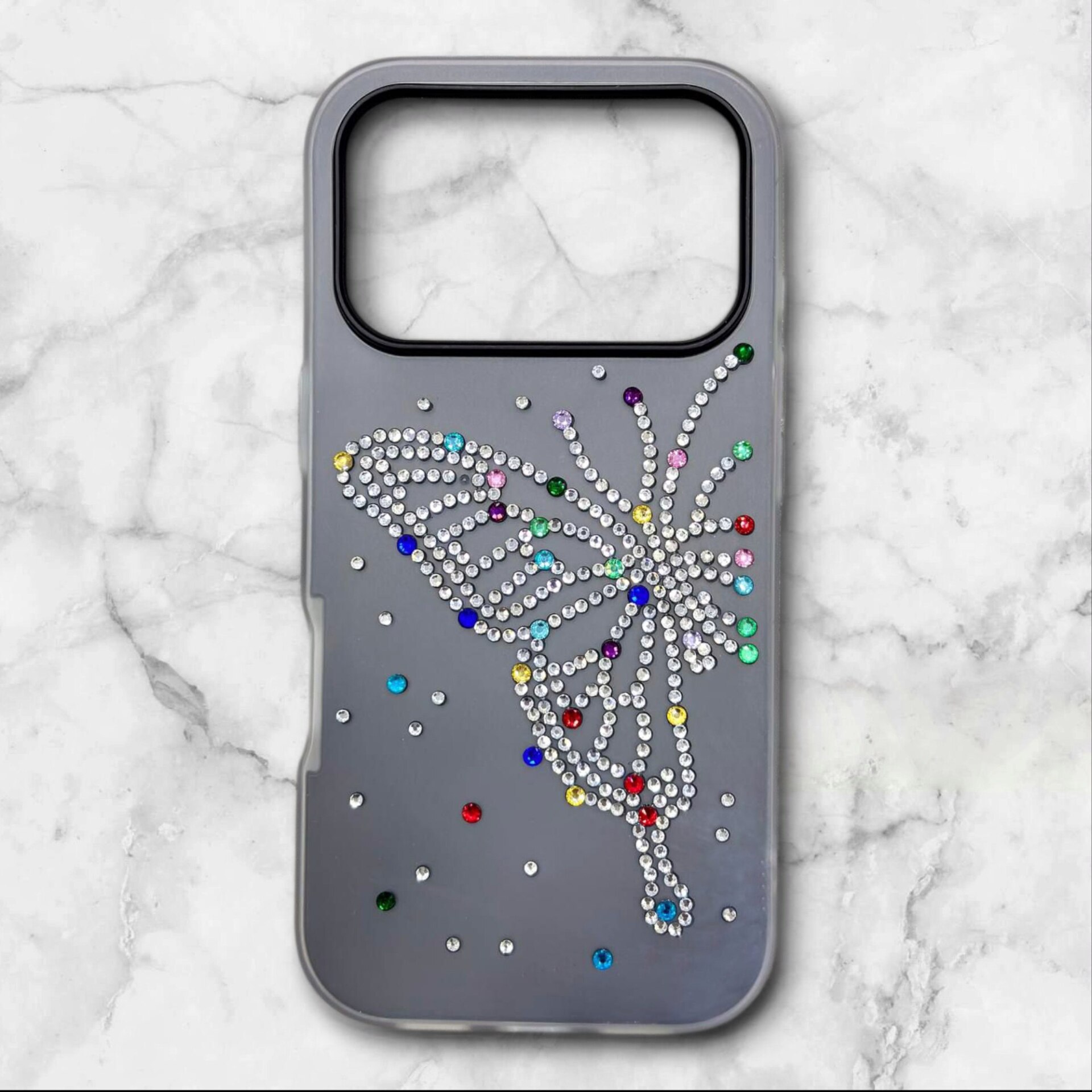  قاب ایفونiPhone17pro پروانه‌ای نگین‌دار سیلیکونی دولایه رنگ مشکی – یونیک کیس 