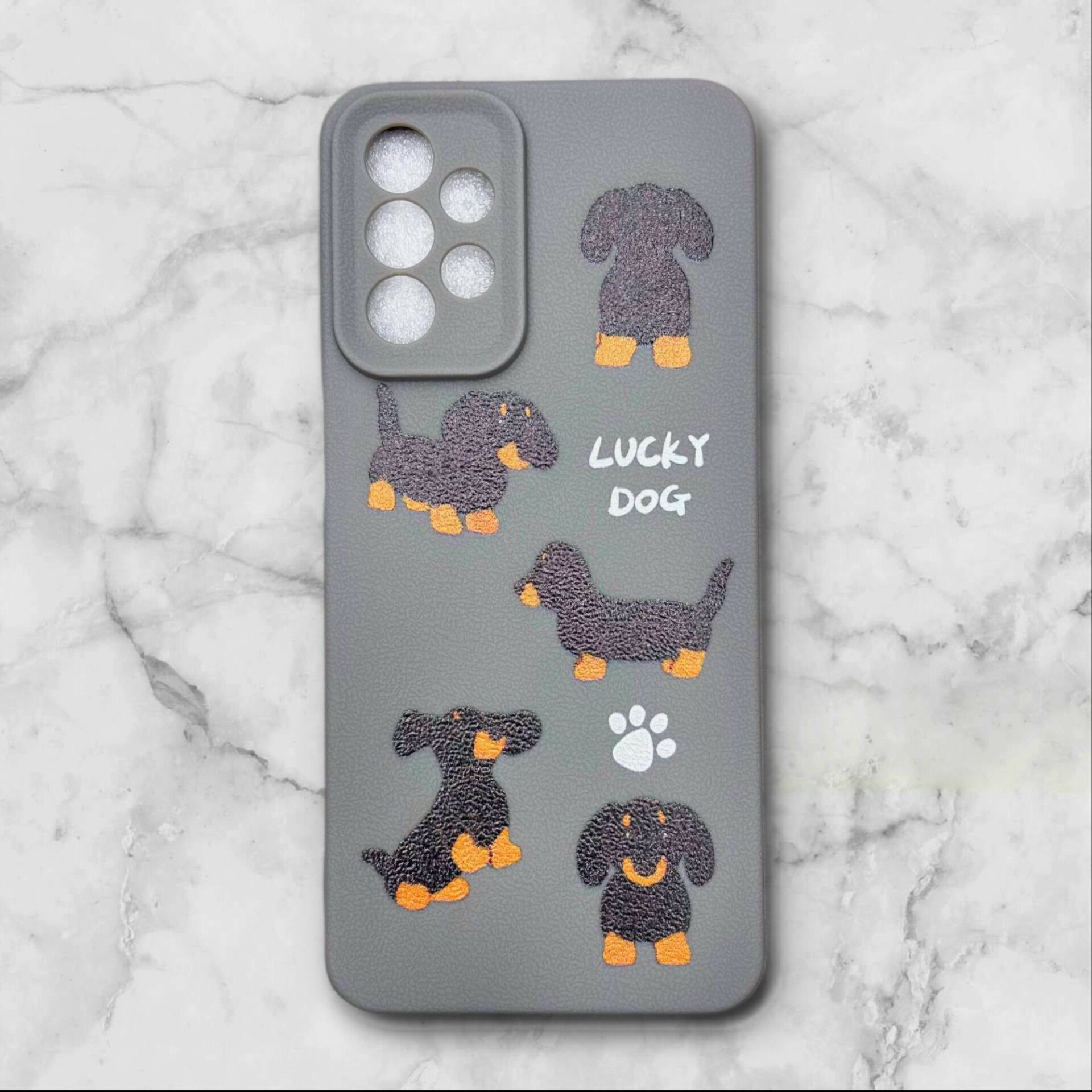  قاب طرح دار سامسونگsamsunga23 طرح سگ بامزه رنگ طوسی – یونیک کیس 