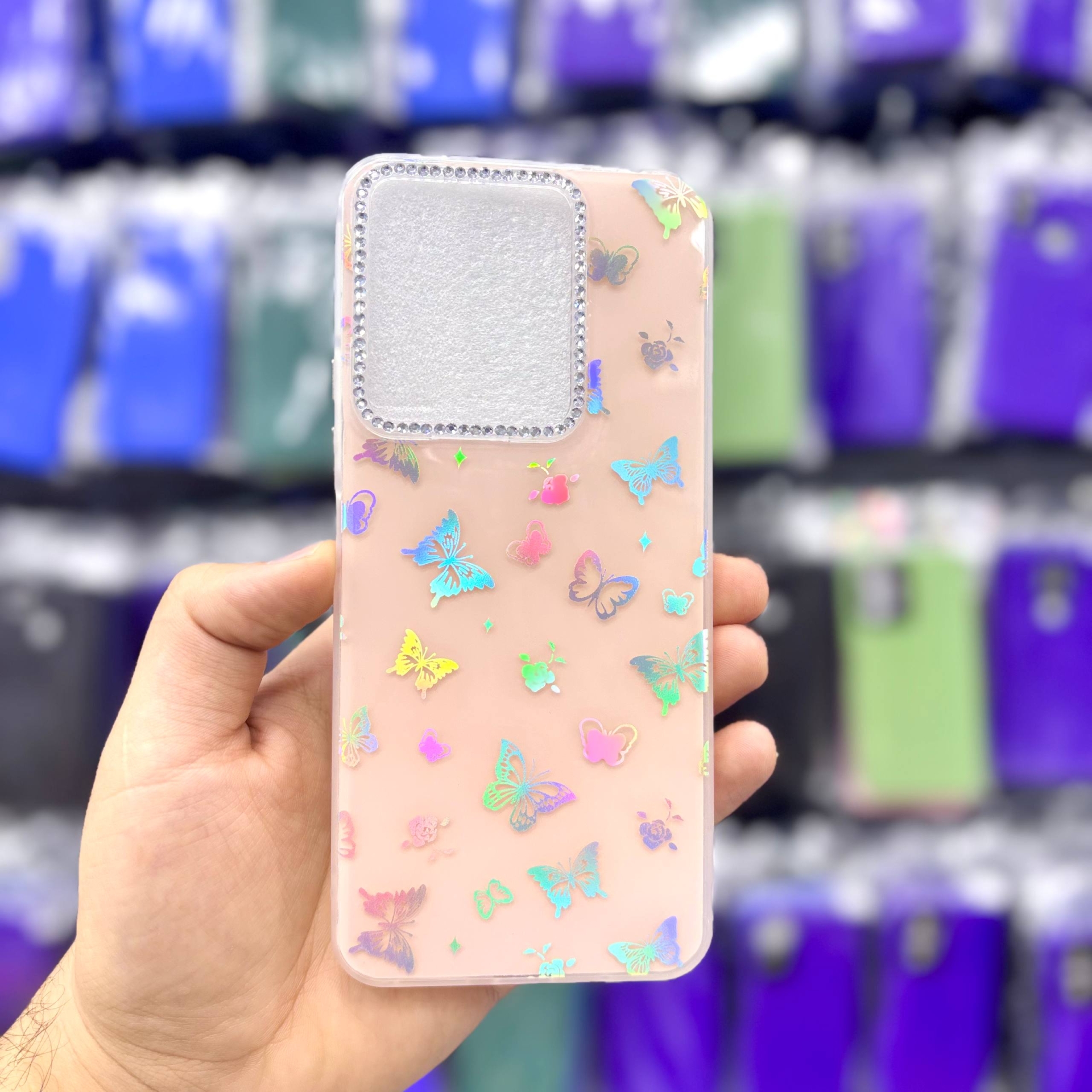  قاب شیائومیpococ85 پروانه‌ای نگین‌دار هولوگرامی رنگ گلبهی – یونیک کیس 